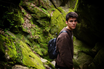 Young attractive guy in the mountains.