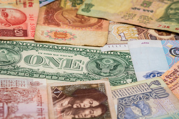 background of various banknotes of different currencies of the world