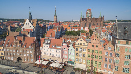Naklejka na ściany i meble Scenic embankment of the Motlawa river with historical buildings in Gdansk