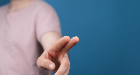 Obraz premium A man hand touching virtual screen, modern background concept , can put your text at the finger, copy space.