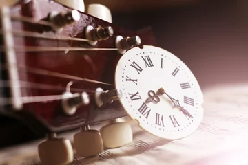 Fotobehang Clock with Roman numerals and guitar, retro composition © sabdiz