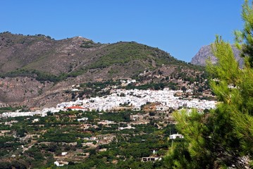 Fototapeta na wymiar View of white village and surrounding countryside, Frigiliana, Andalusia, Spain.
