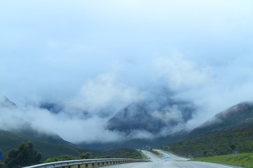 South African travel destination while driving through the clouds and mountains