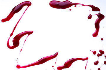 light gray background with frame from spilled cherry syrup