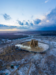 Nikola-lenivets, Kaluga Oblast, Russia, 02 29 2020: Russian farewells of winter called Maslenitsa. Start to burn symbolic straw bridge