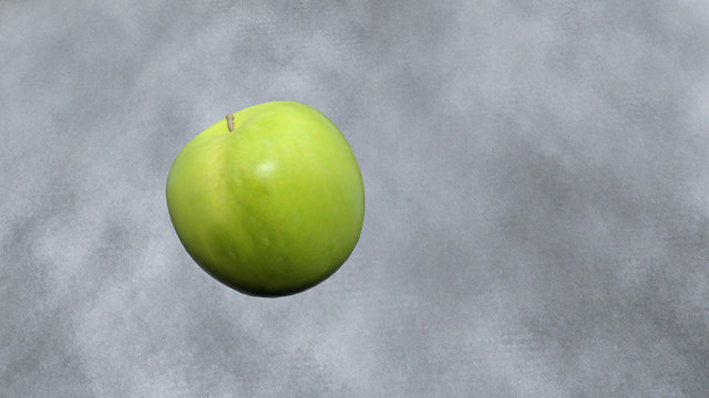 Illustration of a green apple on a gray background