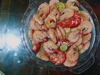 boiled shrimp dishes on the dining table