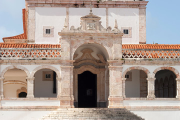 Obraz premium pink marble facade of church at O Sitio Nazare Portugal, sanctuary of our lady of Nazare. Nossa Senhora da Nazaré