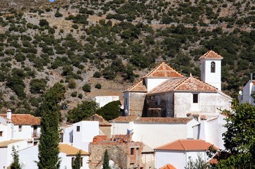 Church and townhouses in the centre of the village, Parauta, Andalusia, Spain.