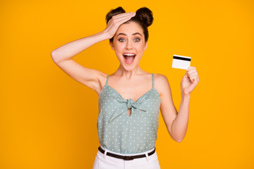 Portrait of astonished crazy girl get vip credit card impressed she can buy many purchases touch...