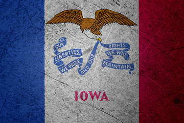 Flag of iowa, USA, on a grunge metal texture