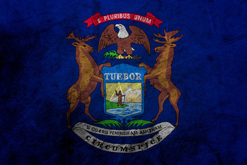 Flag of michigan, USA, on a grunge metal texture
