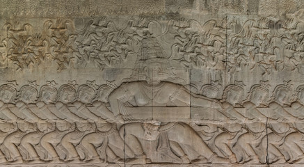 Fototapeta na wymiar Reliefs in the Angkor Wat temple, Cambodia