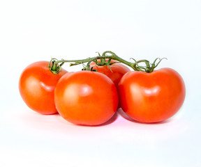 red tomatoes on a light background