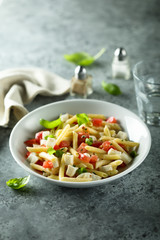 Pasta salad with tomato, mozzarella and basil