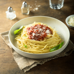 Spaghetti with homemade tomato sauce and cheese