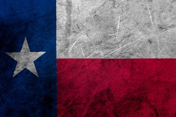 Flag of texas, USA, on a grunge metal texture