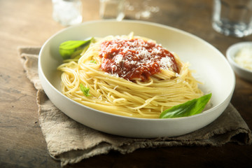 Spaghetti with homemade tomato sauce and cheese