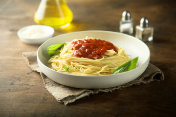 Pasta with tomato sauce and basil