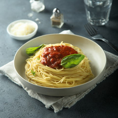 Pasta with tomato sauce and basil