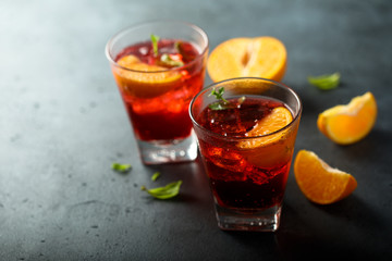 Fototapeta na wymiar Homemade refreshing citrus cocktail served for two