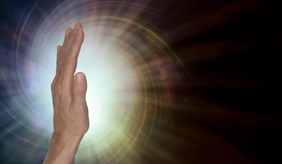 Female healer with powerful palm chakra energy -  upright open hand facing out with a spiral vortex...
