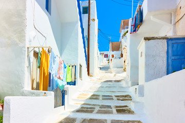 Old street with whitewashed houses in Mykonos