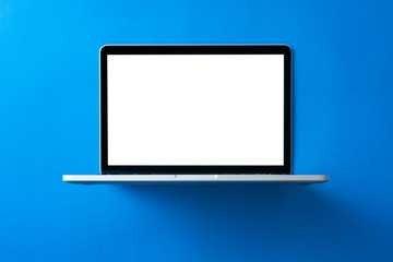 Laptop with blank screen mockup concept. Creative workspace background.