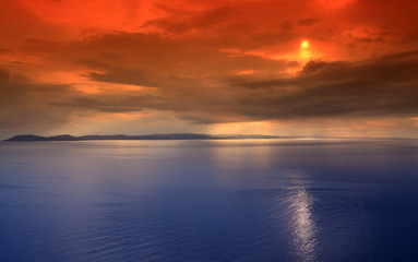 Romantic sunset overlooking Kassandra Peninsula, Halkidiki, Greece.