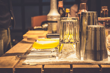 Background of cocktails mixing workshop preparation on counter bar. Professional bartender club preparing fresh delicious tasty cocktail alcohol liquor drink using beverage shaker on vintage concept