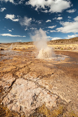 Huge hot geyser. Hot spring and geyser at Sajama National Park in Bolivia. Geothermal activity andean geysers in geysers valley, Sajama, Bolivia, South America