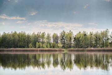 Fototapeta na wymiar Quiet mountain lake in spring