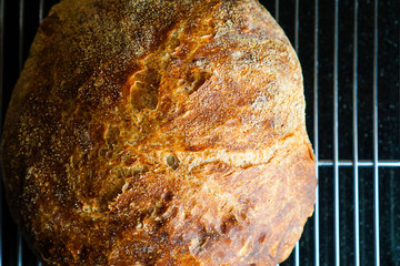 Homemade bread on a dark surface