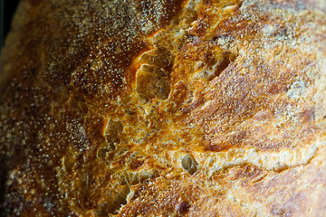 Homemade bread on a dark surface