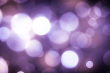 Bright violet bokeh lights abstract background