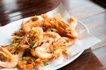 Deep fried shrimp asia style true exotic Thai traditional local food culture fresh natural prawns marinate with organic healthy chili, salt, pepper. Delicious crispy, spicy authentic seafood meal
