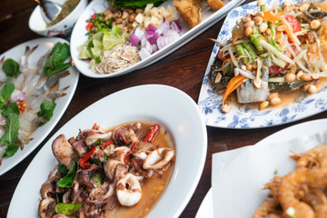 Background delicious tasty authentic real exotic Thai seafood meal set for lunch and dinner food. Healthy organic homemade fresh seafood true local menu natural ingredient from local fisherman market