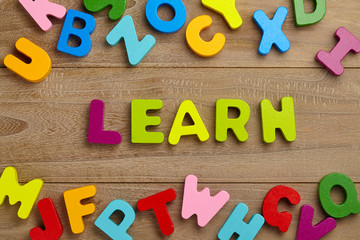 Fototapeta premium Alphabet wooden letters for early education concept