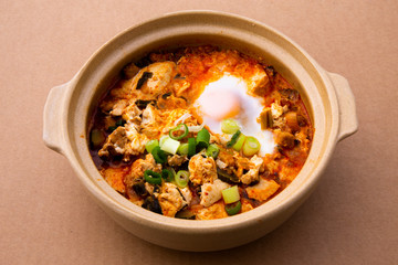 Korean spicy silken tofu stew which is called Sundubu Jjigae