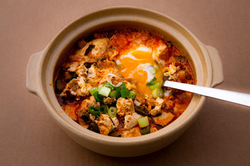 Korean spicy silken tofu stew which is called Sundubu Jjigae