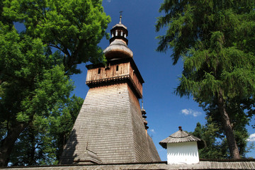 Old larch-wood church in Rabka-Zdroj in Poland  - obrazy, fototapety, plakaty