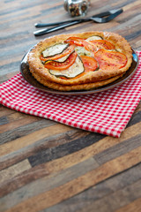Fine Tomato Zucchini Tarts Mozzarella, pesto and virgin olive oil