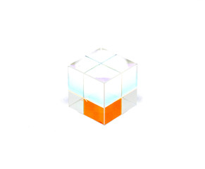 Glass cube with color transfusion elements Isolated on a white background