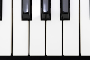 Naklejka premium Electronic musical keyboard synthesizer close-up