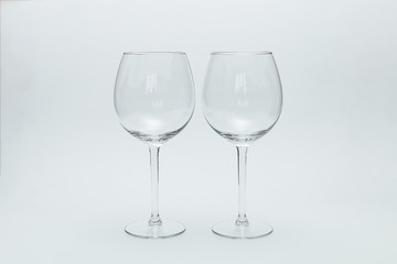 Two glasses for wine on a white background