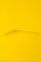 Minimalist layout of bright yellow papers