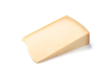 Isolated piece of parmesan cheese on the white background