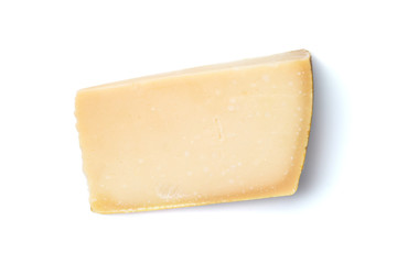 Isolated piece of parmesan cheese on the white background