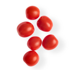 Branch of fresh cherry tomatoes isolated on white, top view