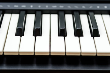 music keyboard isolated, front view with perspective